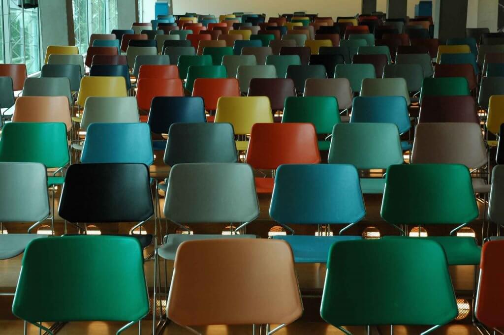 Classroom with empty seats where students learn about racism